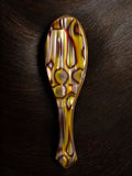 Oribe flat hair brush with Italian resin handle, imported from the UK