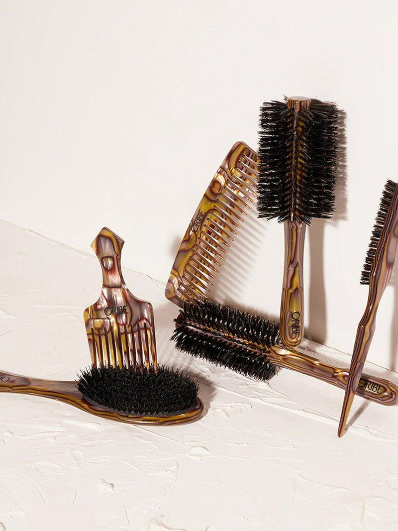 Oribe flat hair brush with Italian resin handle, imported from the UK