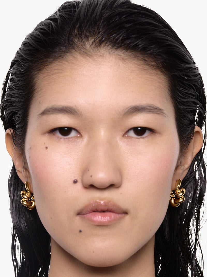 Maria Black gold-plated recycled silver coil hoop earrings, imported from the UK