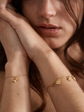 Monica Vinader gold shell charm bracelet, imported from the UK