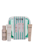 NEOM Wellbeing Travel Edit gift set with three bodycare products, UK version