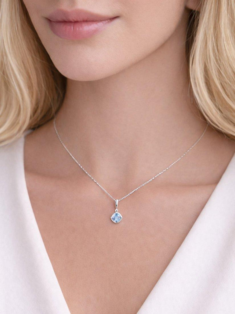 E.W Adams blue topaz diamond pendant necklace 9ct white gold, UK version