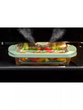 Lékué glass steam cooker with tray and recipe book (British brand)