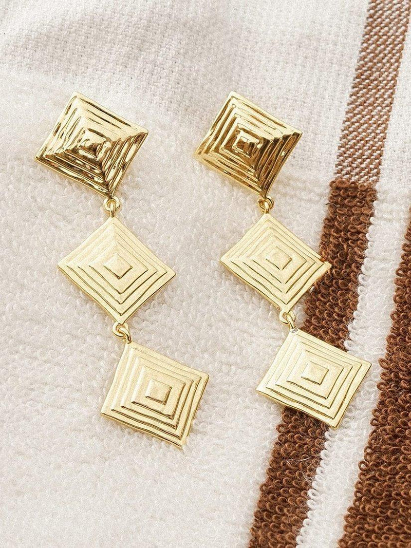 Daisy London gold drop earrings, imported from the UK