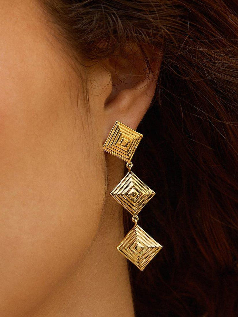 Daisy London gold drop earrings, imported from the UK