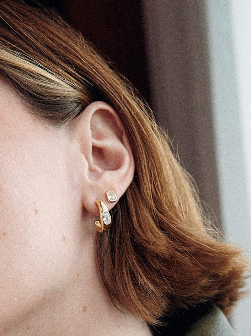 Daisy London gold hoop earrings with lab-grown sapphire (British brand)