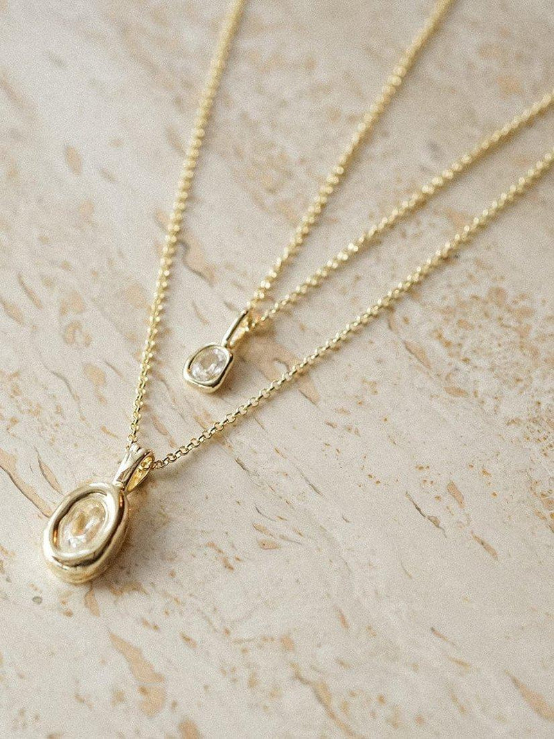 Daisy London gold locket necklace, lab-grown sapphire (British brand)