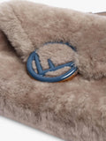 Pre-loved Fendi shearling belt bag taupe with gold hardware, imported from the UK