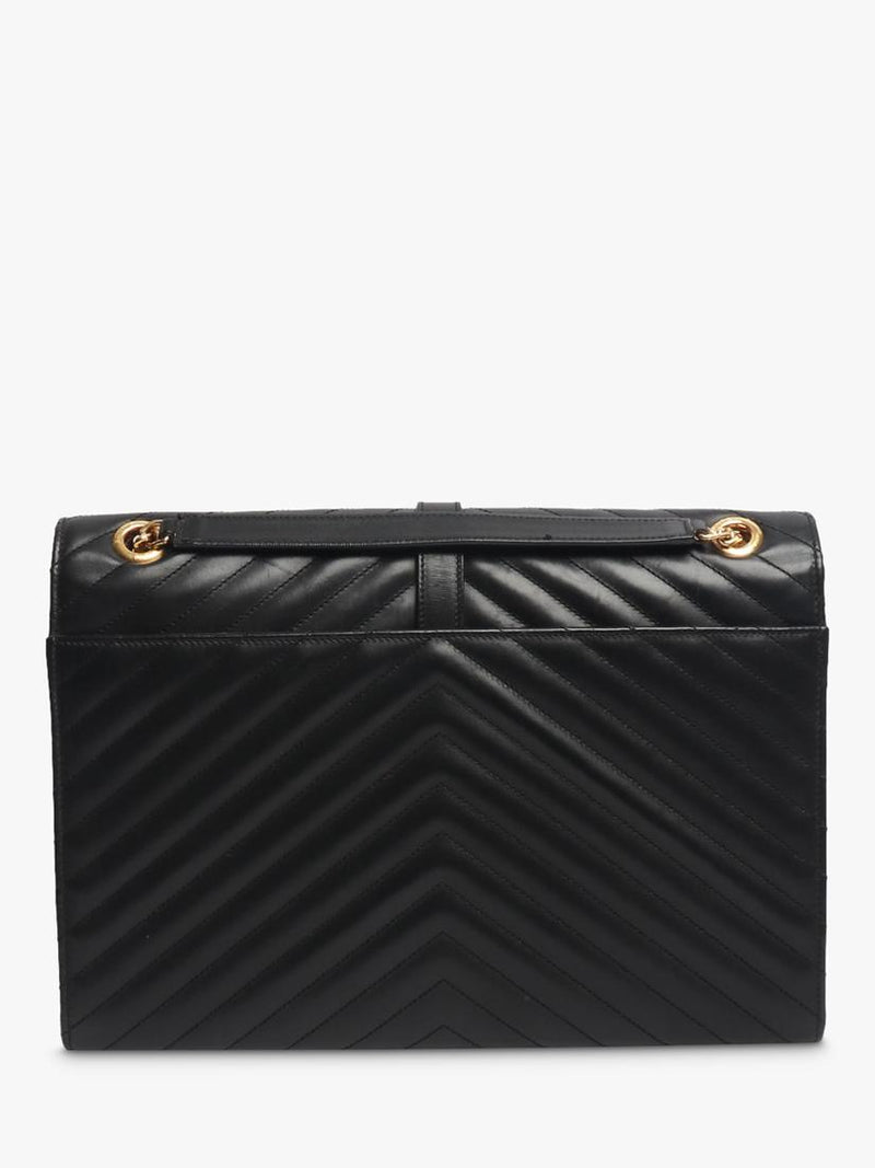 Saint Laurent pre-loved leather envelope bag with gold hardware (British brand)