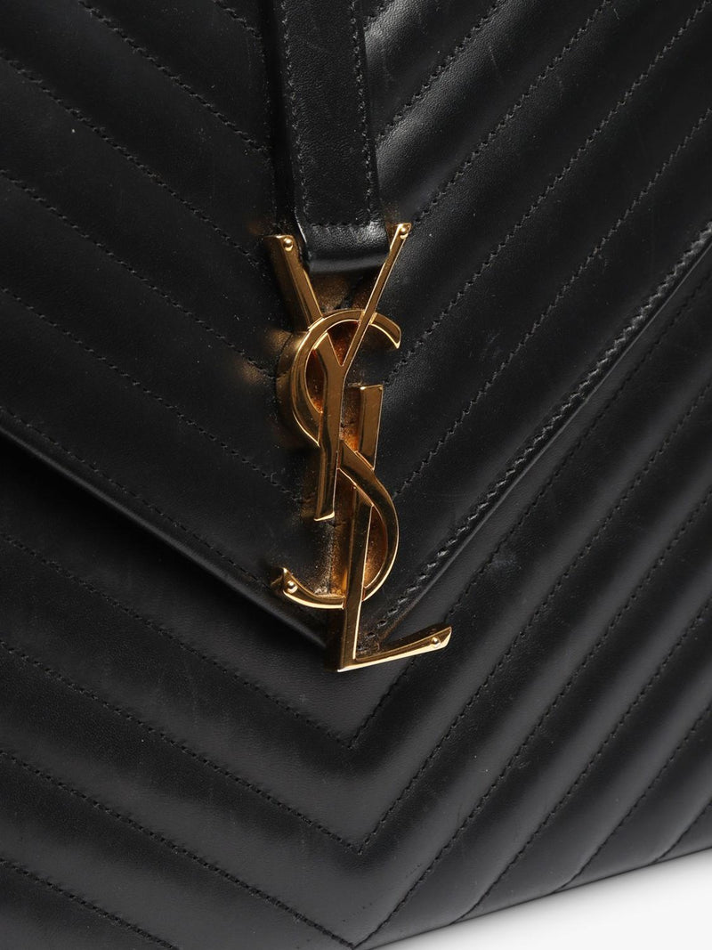 Saint Laurent pre-loved leather envelope bag with gold hardware (British brand)