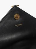 Saint Laurent pre-loved leather envelope bag with gold hardware (British brand)