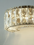 Aria clear wall light with faceted crystals, imported from the UK