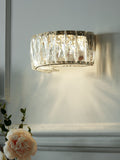 Aria clear wall light with faceted crystals, imported from the UK
