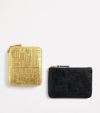 Comme Des Garçons leather embossed zipped pouch - British product