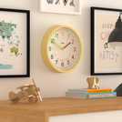 Jones Clocks kids analogue wall clock yellow 25cm diameter, UK version