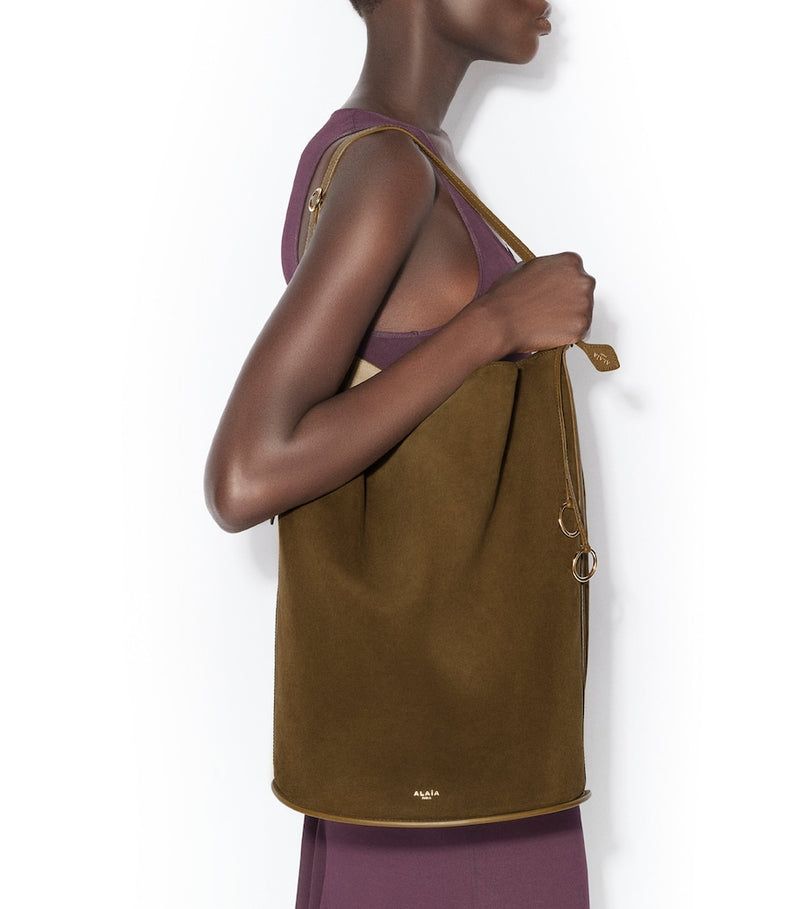 Alaïa large suede-leather hip bucket bag (British brand)