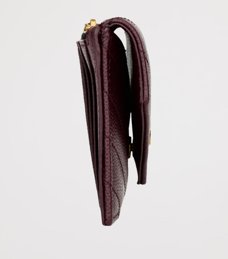 Saint Laurent Cassandre Matelassé envelope wallet (British brand)