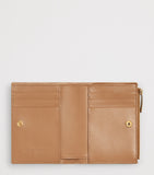 Bottega Veneta small leather Intrecciato bifold wallet, imported from the UK
