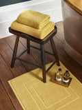 Christy Saffron Yellow Brixton bath mat 60x60cm (British brand)