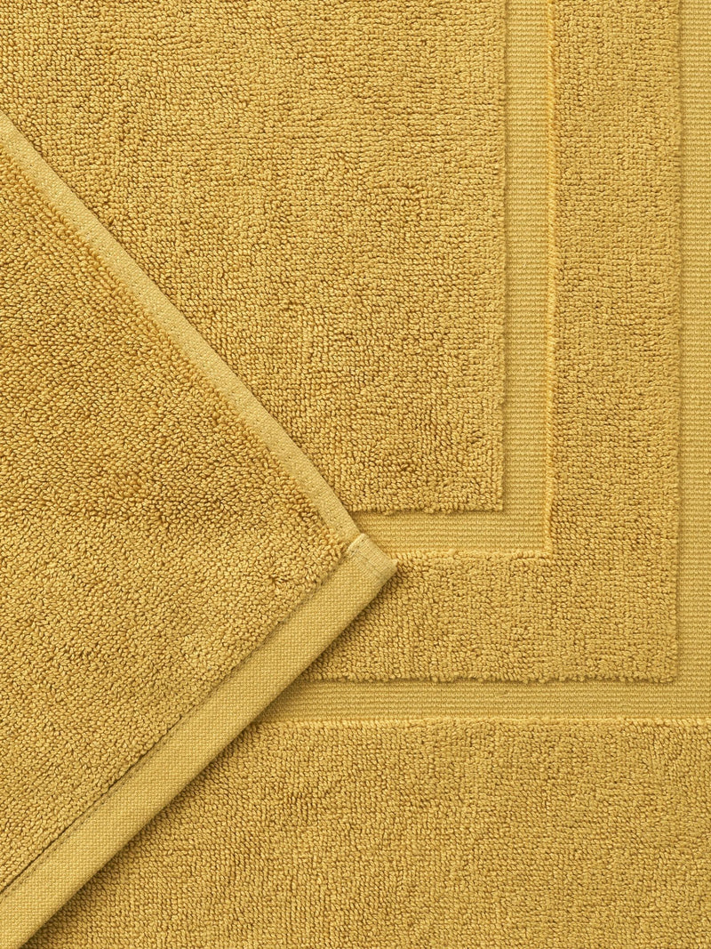 Christy Saffron Yellow Brixton bath mat 60x60cm (British brand)