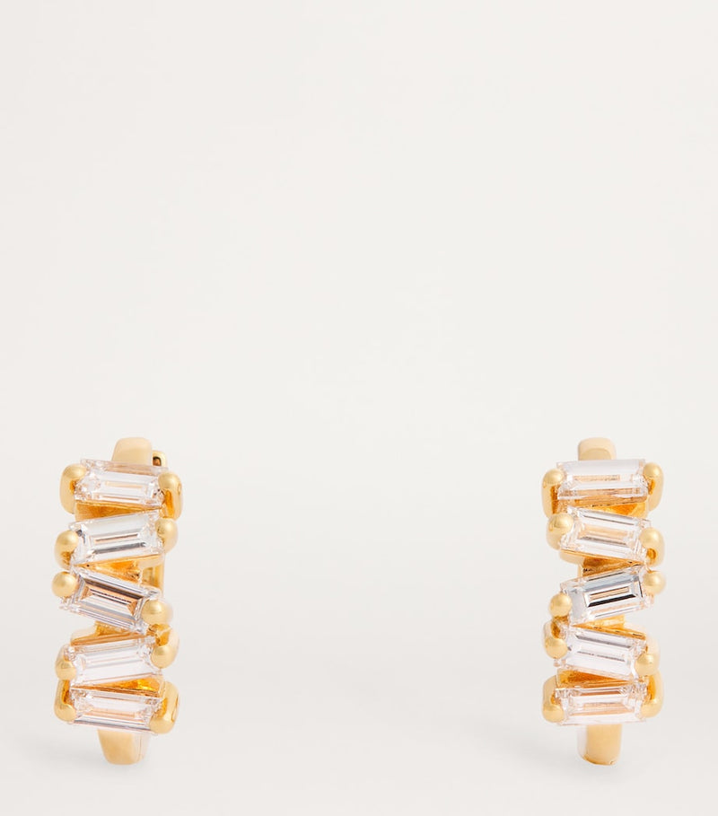 Suzanne Kalan yellow gold huggie earrings with baguette diamonds (British brand)