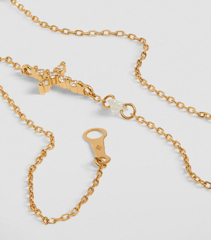 Persée gold cross bracelet with diamonds (British brand)