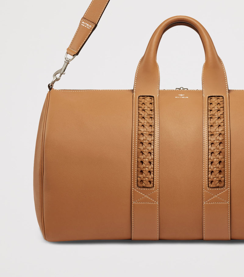 Aviteur leather woven-detail holdall - British product