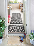 My Mat charcoal crescent large runner, imported from the UK