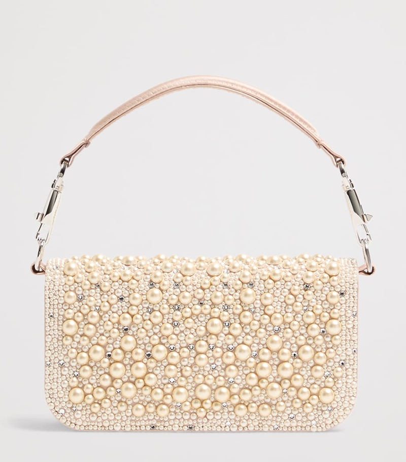 Valentino Garavani small embellished Locò shoulder bag, imported from the UK