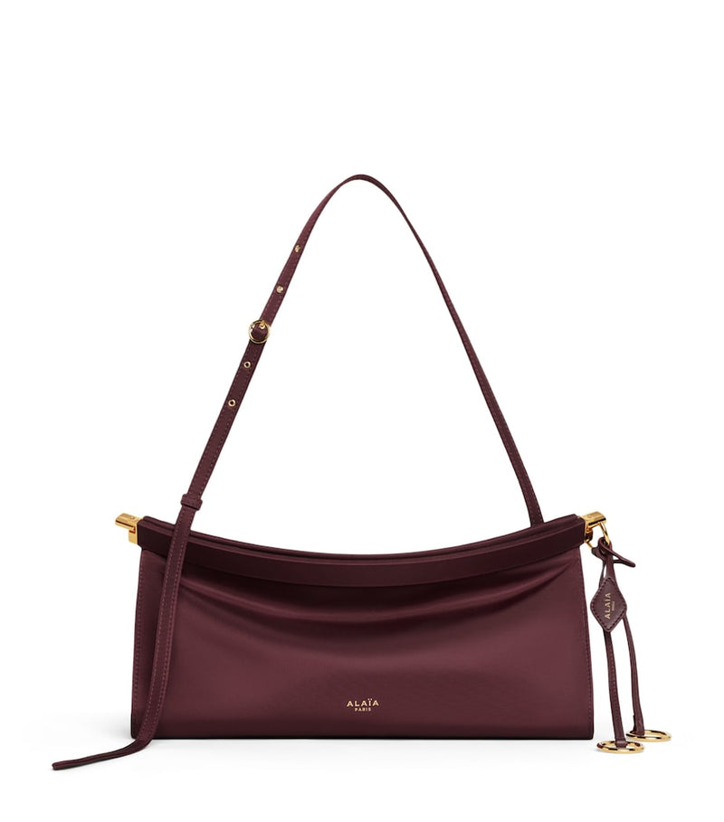 Alaïa Le Click East West shoulder bag medium size - British product