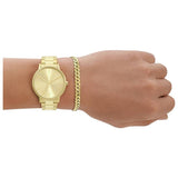 Armani Exchange gold-tone stainless steel bracelet watch (British brand)