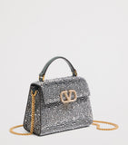 Valentino Garavani mini leather top-handle bag - British product