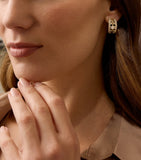 Boodles diamond and gold earrings, imported from the UK