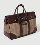 Brunello Cucinelli leather-trim chevron holdall, imported from the UK