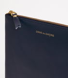 Comme Des Garçons zipped leather pouch - British product