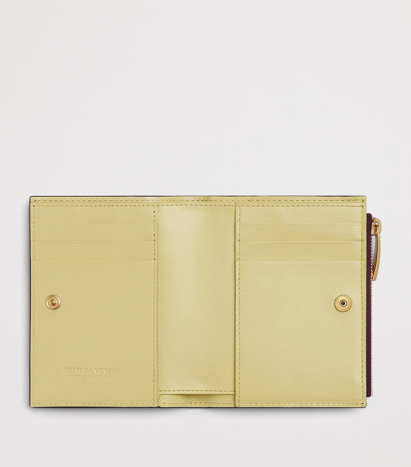 Bottega Veneta small leather Intrecciato bifold wallet, imported from the UK