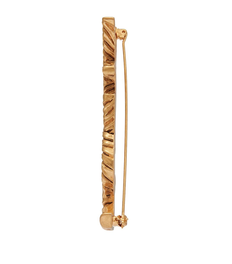 Saint Laurent YSL twisted brooch, UK version