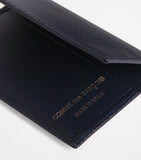 Comme des Garçons leather bifold card holder 10x7cm, imported from the UK
