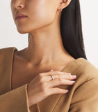 Suzanne Kalan yellow gold huggie earrings with baguette diamonds (British brand)