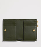 Bottega Veneta small leather-suede bifold wallet (British brand)