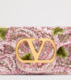 Valentino Garavani small Locò shoulder bag with sequins, imported from the UK