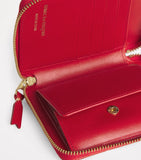 Comme des Garçons polka-dot leather zipped wallet (British brand)