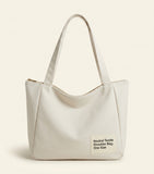 McQueen denim Manta to-handle bag, imported from the UK
