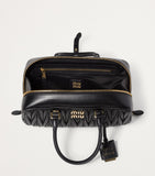 Miu Miu Arcadie top-handle bag imported from the UK