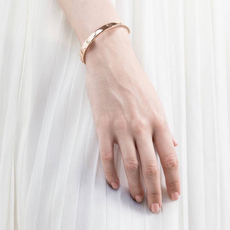 Radley rose gold plated jumping dog bangle (British brand)