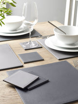 Next Charcoal Grey Reversible Faux Leather Placemats and Coasters Set of 4- Buy online at McGrocer