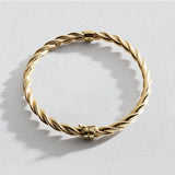 Revere 9ct yellow gold twisted chain bangle (British brand)