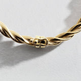 Revere 9ct yellow gold twisted chain bangle (British brand)