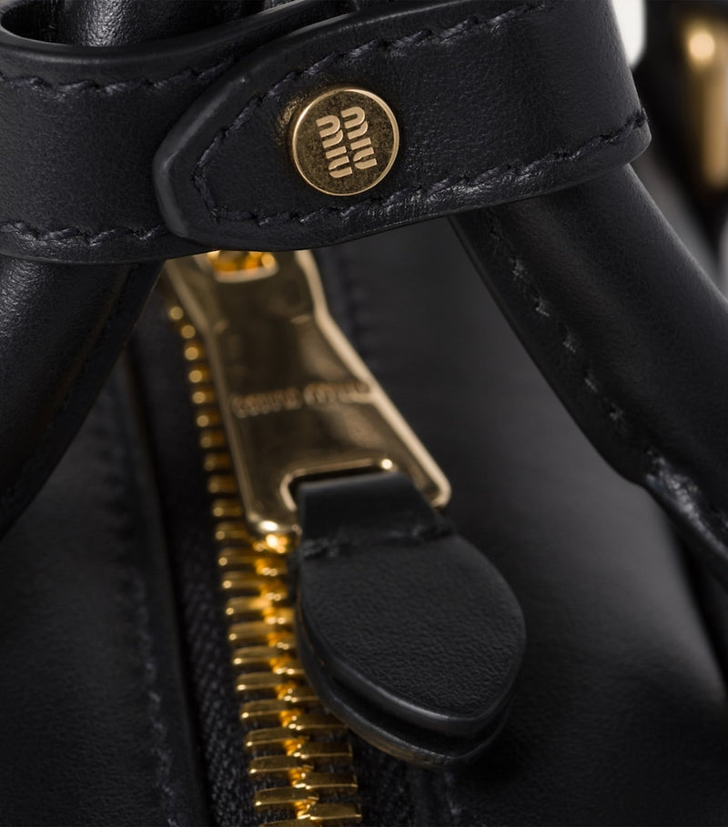 Miu Miu Arcadie top-handle bag in leather, imported from the UK