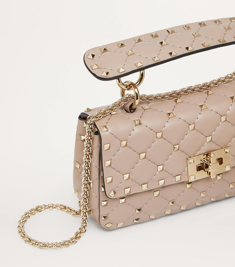 Valentino Garavani Small Rockstud Spike top-handle bag quilted lambskin (British brand)